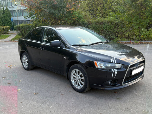 2013 Mitsubishi Lancer X Рестайлинг, чёрный, 840000 рублей - вид 1