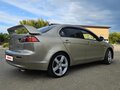 2007 Mitsubishi Lancer X, бежевый, 580000 рублей - вид 9