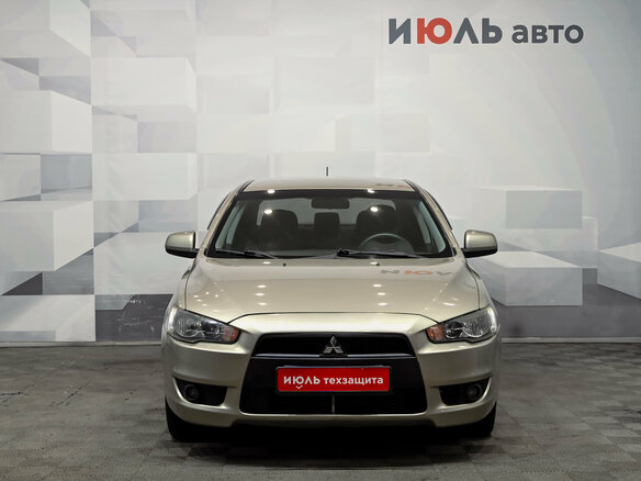 2008 Mitsubishi Lancer X, бежевый, 580000 рублей - вид 2