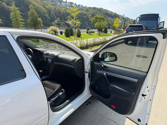 2012 Skoda Octavia II (A5) Рестайлинг, белый, 1390000 рублей - вид 4