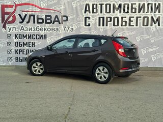2015 Hyundai Solaris I Рестайлинг, коричневый, 808000 рублей, вид 4
