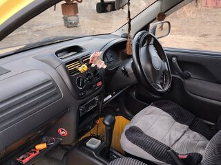 2002 Suzuki Ignis I (HT), жёлтый, 300000 рублей, вид 5