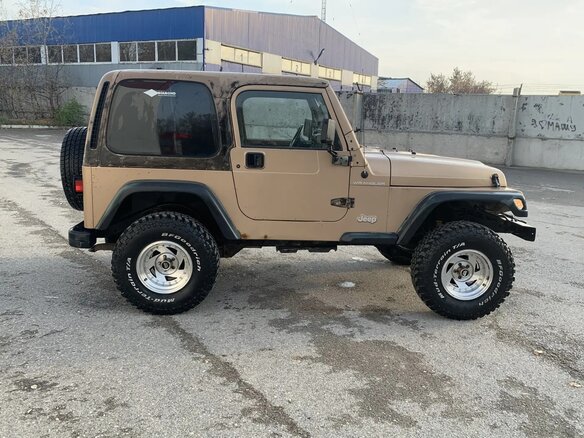 1998 Jeep Wrangler II (TJ), коричневый, 1070000 рублей - вид 4