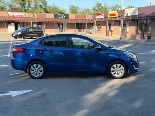 2012 Kia Rio 4-speed III, синий, 899000 рублей, вид 4
