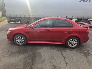 2013 Mitsubishi Lancer X Рестайлинг, красный, 900000 рублей, вид 2