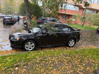 2007 Mitsubishi Lancer X, чёрный, 699000 рублей, вид 1