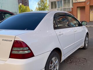 2003 Toyota Corolla IX (E120, E130) Рестайлинг, белый, 560000 рублей, вид 5