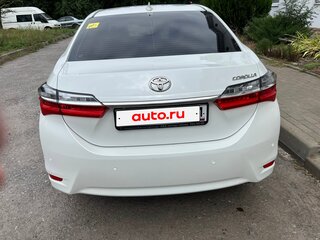 2018 Toyota Corolla XI (E160, E170, E180) Рестайлинг 1, белый, 1660000 рублей, вид 2