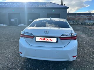 2017 Toyota Corolla XI (E160, E170, E180) Рестайлинг 1, белый, 1790000 рублей, вид 3