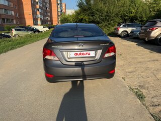 2011 Hyundai Solaris I, чёрный, 650000 рублей, вид 4