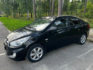 2011 Hyundai Solaris I, чёрный, 650000 рублей, вид 4