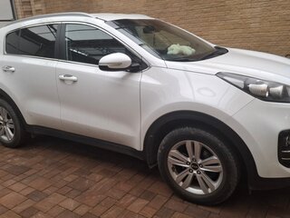 2016 Kia Sportage III Рестайлинг, белый, 1900000 рублей, вид 2