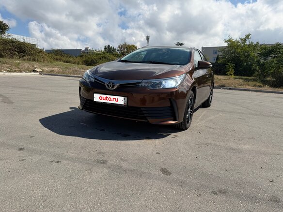 2016 Toyota Corolla XI (E160, E170, E180) Рестайлинг 1, коричневый, 1399999 рублей - вид 8