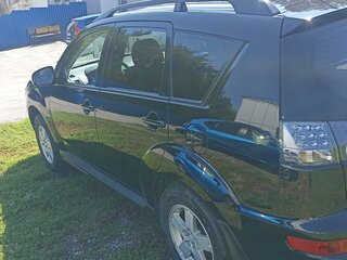 2011 Mitsubishi Outlander II Рестайлинг, чёрный, 1230000 рублей, вид 4