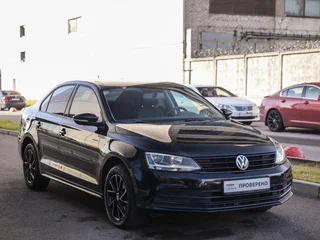 2016 Volkswagen Jetta VI Рестайлинг, чёрный, 1239777 рублей, вид 5