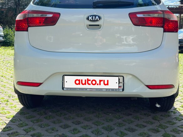 2013 Kia Rio 4-speed III, белый, 940000 рублей - вид 1