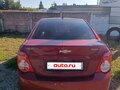 2012 Chevrolet Aveo II, красный, 650000 рублей - вид 4