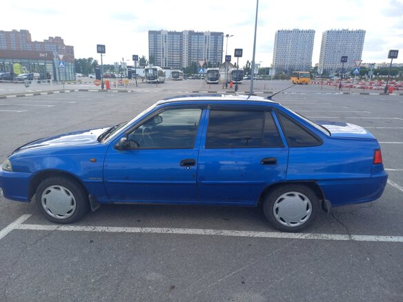 2011 Daewoo Nexia I Рестайлинг, синий, 235000 рублей - вид 11