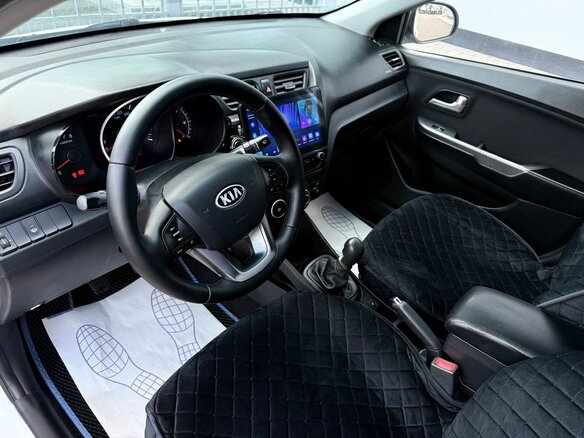 2014 Kia Rio 5-speed III, белый - вид 14