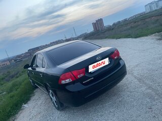 2010 Kia Magentis 5-speed II Рестайлинг, чёрный, 720000 рублей, вид 3