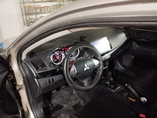 2012 Mitsubishi Lancer X Рестайлинг, серебристый, 650000 рублей, вид 3