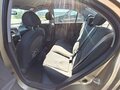 2010 Kia Rio II Рестайлинг, бежевый - вид 7