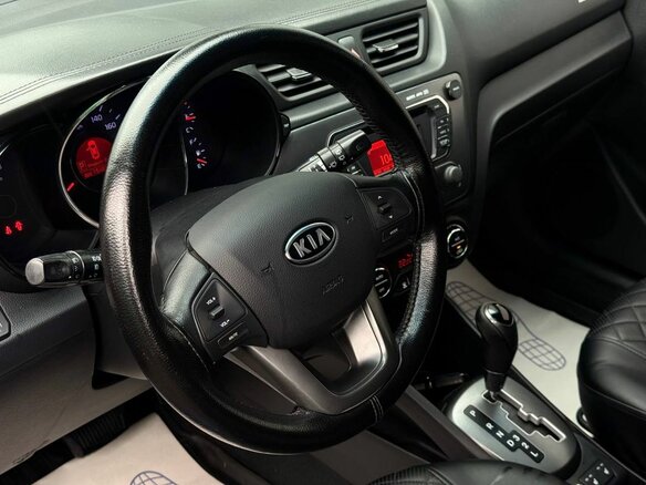 2012 Kia Rio 4-speed III, синий, 800000 рублей - вид 17