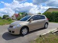 2010 Nissan Tiida I, коричневый - вид 1