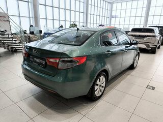 2013 Kia Rio 5-speed III, синий, 550000 рублей, вид 5