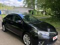2013 Toyota Corolla XI (E160, E170, E180), чёрный, 1450000 рублей - вид 2