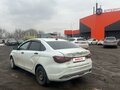 2024 Lada (ВАЗ) Vesta I Рестайлинг (NG), белый, 863000 рублей - вид 2