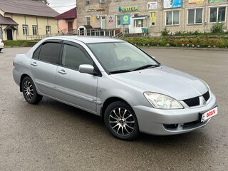 2007 Mitsubishi Lancer IX Рестайлинг, серебристый, 600000 рублей, вид 2