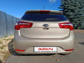 2014 Kia Rio 6-speed III, бежевый, 870000 рублей, вид 3