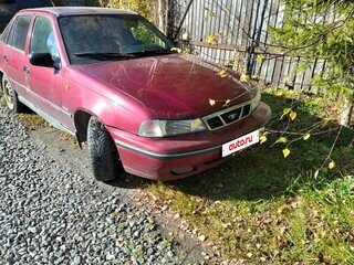 2006 Daewoo Nexia I, красный, 70000 рублей, вид 1