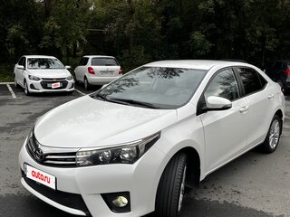 2013 Toyota Corolla XI (E160, E170, E180), белый, 1450000 рублей, вид 3