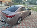 2021 Kia Rio IV Рестайлинг, коричневый, 1680000 рублей - вид 1