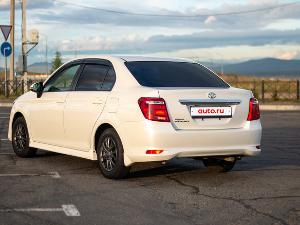 2016 Toyota Corolla Axio XI (E160, E170, E180) Рестайлинг 1, белый, 925000 рублей - вид 4