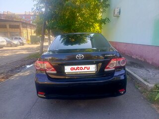 2010 Toyota Corolla X (E140, E150) Рестайлинг, чёрный, 700000 рублей, вид 3
