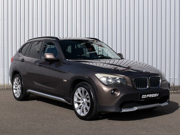 2011 BMW X1 18i I (E84), коричневый