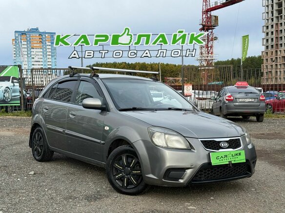 2011 Kia Rio II Рестайлинг, серебристый, 549000 рублей
