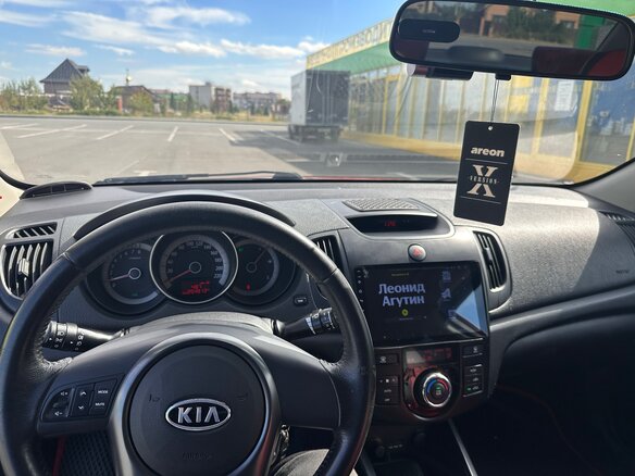 2010 Kia Cerato 5-speed II, красный, 830000 рублей - вид 9
