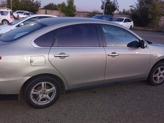 2014 Nissan Almera III (G15), серый, 700000 рублей, вид 4