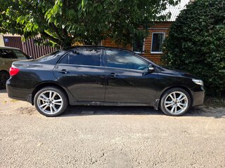 2012 Toyota Corolla X (E140, E150) Рестайлинг, чёрный, 650000 рублей, вид 1