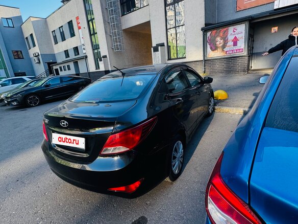 2014 Hyundai Solaris I Рестайлинг, чёрный, 330000 рублей - вид 4