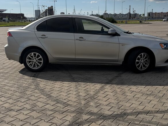 2012 Mitsubishi Lancer X Рестайлинг, серебристый, 850000 рублей - вид 5