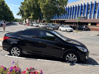 2011 Hyundai Solaris I, чёрный, 800000 рублей, вид 3
