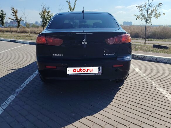 2007 Mitsubishi Lancer X, чёрный - вид 3