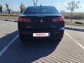 2007 Mitsubishi Lancer X, чёрный - вид 3