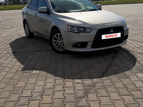2012 Mitsubishi Lancer X Рестайлинг, серебристый, 850000 рублей - вид 2
