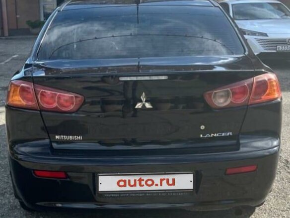 2008 Mitsubishi Lancer X, чёрный, 620000 рублей - вид 6